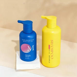 Customized 300ml hand washing hydraulic pump bottle with round shoulder and large capacity 500ml shampoo bottle for cosmetic packaging materials