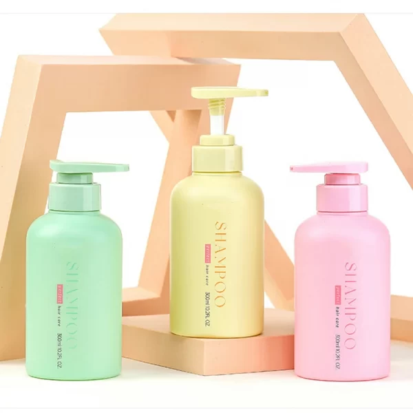 Customized color 300ml pink round shoulder PET shampoo bottle (10)