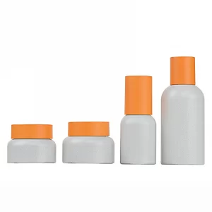 Processing customized imitation stone new process glass set bottle 30-50g cream bottle orange outer cap bottle white lotion bottle